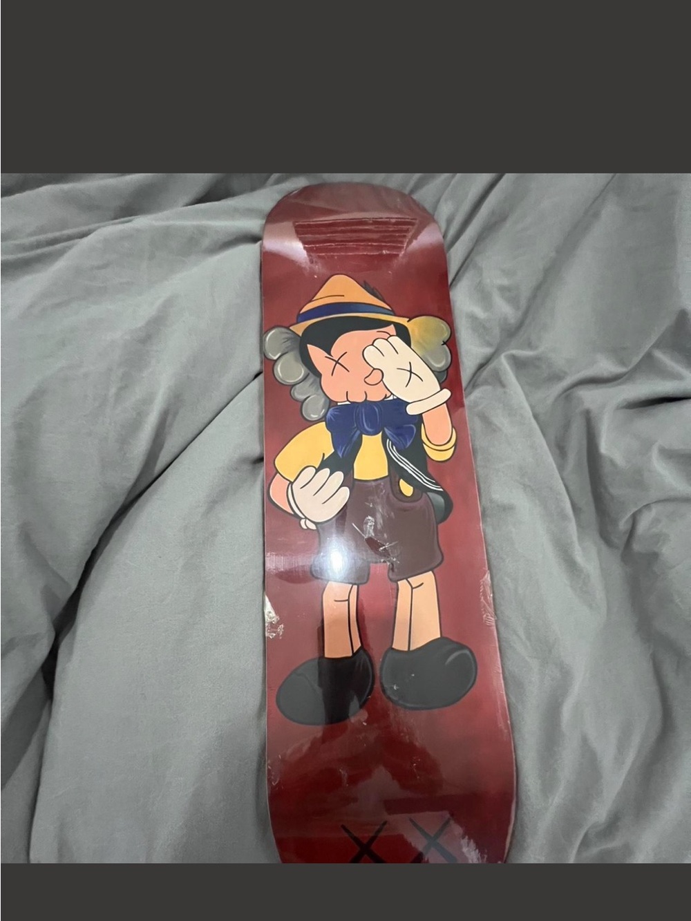 KAWS × Pinocchio "XX Air" Limited Edition Skateboard Deck - 8" × 31.7"